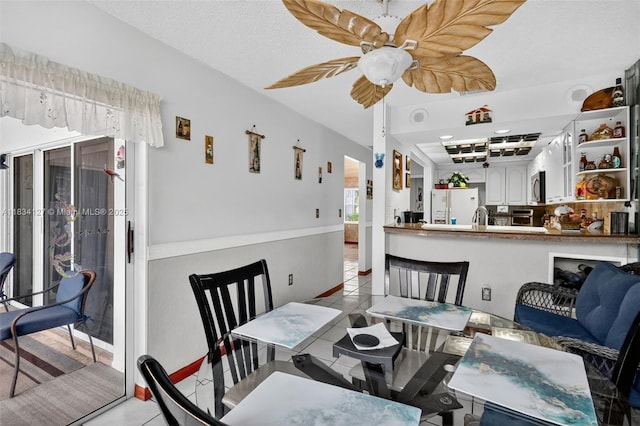 14355 SW 158th St, Miami, FL 33177 - dining space with light tile patterned floors and a ceiling fan