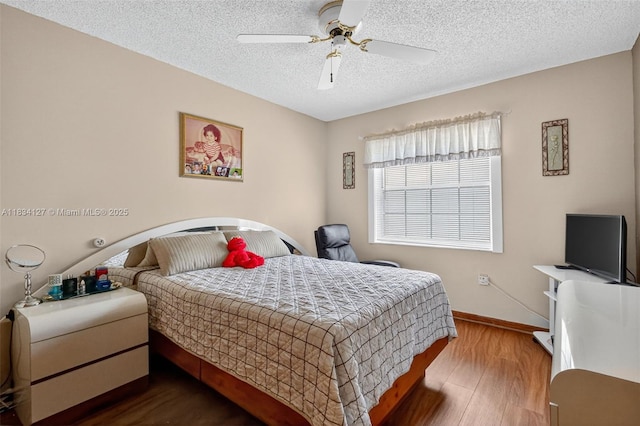 14355 SW 158th St, Miami, FL 33177 - bedroom with wood finished floors, a textured ceiling, and a ceiling fan