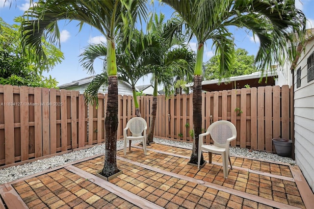 14355 SW 158th St, Miami, FL 33177 - fenced backyard featuring a patio area