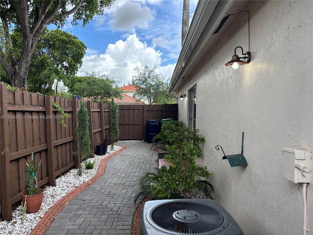 10234 NW 57th St, Doral, FL 33178 - view of patio featuring a gate