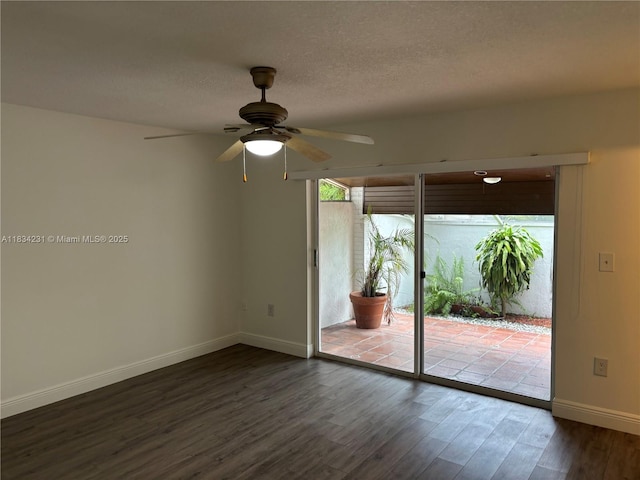 10234 NW 57th St, Doral, FL 33178 - spare room with dark wood-style flooring, a ceiling fan, and a textured ceiling