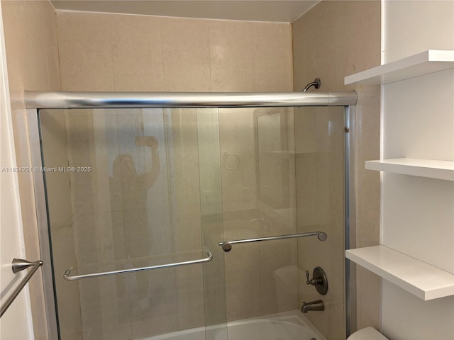 10234 NW 57th St, Doral, FL 33178 - full bathroom with toilet and shower / bath combination with glass door