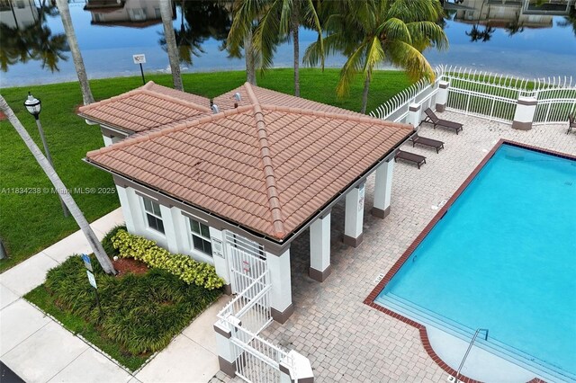 6293 SW 165th Ave, Miami, FL 33193 - view of swimming pool with a water view and a patio area