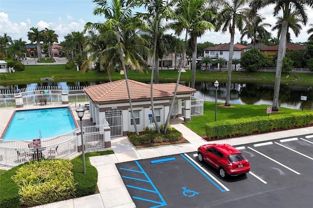 6293 SW 165th Ave, Miami, FL 33193 - view of property with uncovered parking, a water view, and a community pool