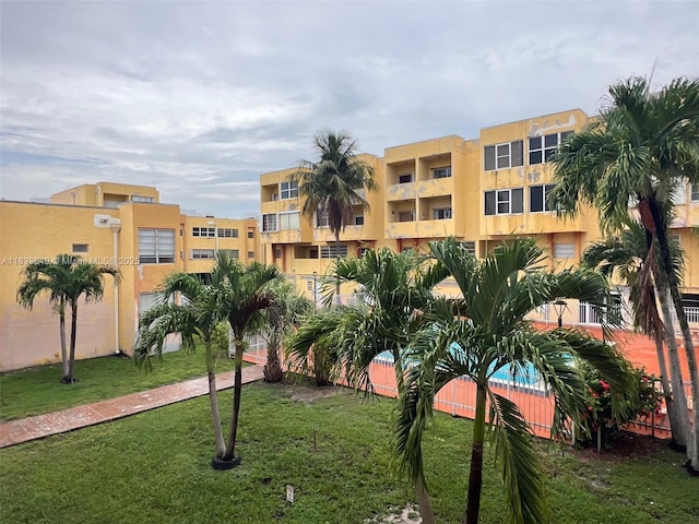 1555 W 44th Pl Unit 103, Hialeah, FL 33012 - view of apartment building / complex