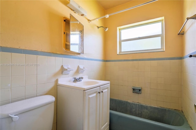 3255 William Ave, Miami, FL 33133 - full bathroom with a bath, vanity, tile walls, and wainscoting