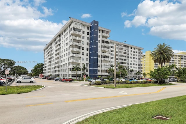 4350 Hillcrest Dr Unit 303, Hollywood, FL 33021 - view of apartment building / complex featuring uncovered parking