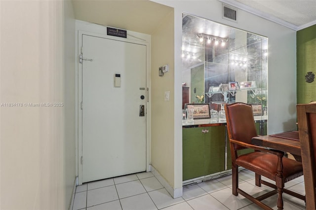 4350 Hillcrest Dr Unit 303, Hollywood, FL 33021 - interior space with light tile patterned floors and crown molding