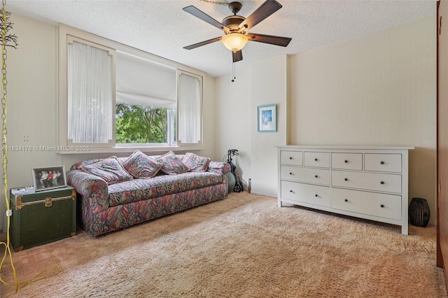 4350 Hillcrest Dr Unit 303, Hollywood, FL 33021 - sitting room with carpet, a ceiling fan, and a textured ceiling