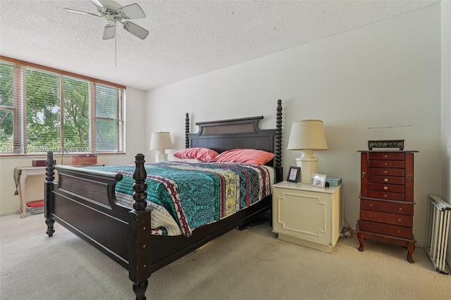 4350 Hillcrest Dr Unit 303, Hollywood, FL 33021 - bedroom featuring light carpet, a textured ceiling, and a ceiling fan