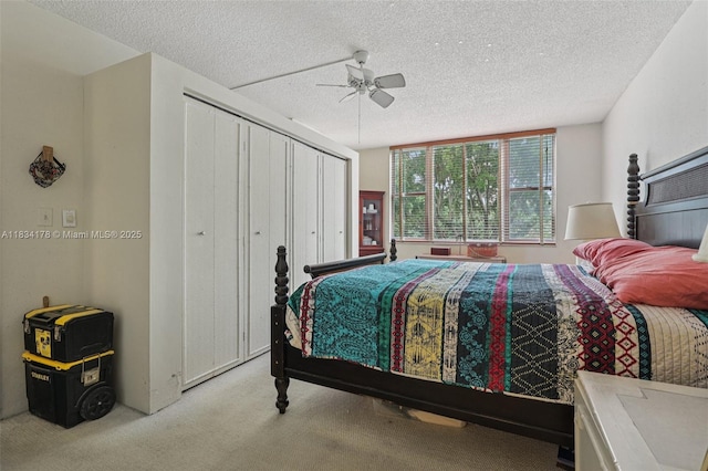 4350 Hillcrest Dr Unit 303, Hollywood, FL 33021 - bedroom featuring carpet floors, a textured ceiling, a closet, and a ceiling fan