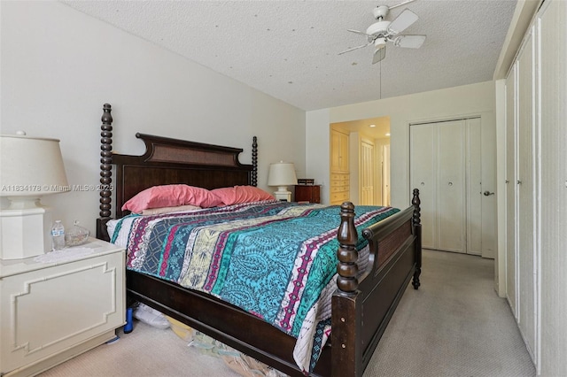 4350 Hillcrest Dr Unit 303, Hollywood, FL 33021 - carpeted bedroom with a ceiling fan and a textured ceiling