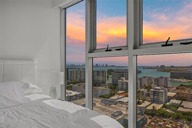 6899 Collins Ave Unit 2004, Miami Beach, FL 33141 - bedroom featuring a view of city, a water view, and multiple windows