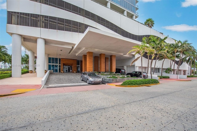 6899 Collins Ave Unit 2004, Miami Beach, FL 33141 - view of building exterior with a carport