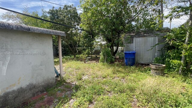 7080 Hope St, Hollywood, FL 33024 - view of yard with a storage unit