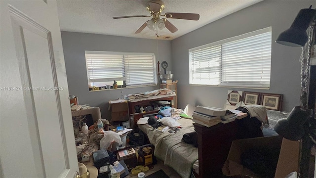 7080 Hope St, Hollywood, FL 33024 - bedroom with a ceiling fan and a textured ceiling