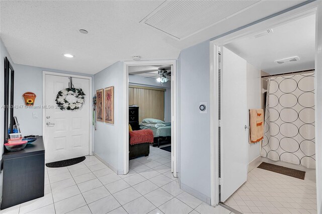 571 SW 142nd Ave Unit 410O, Pembroke Pines, FL 33027 - foyer entrance with light tile patterned flooring, a ceiling fan, and recessed lighting