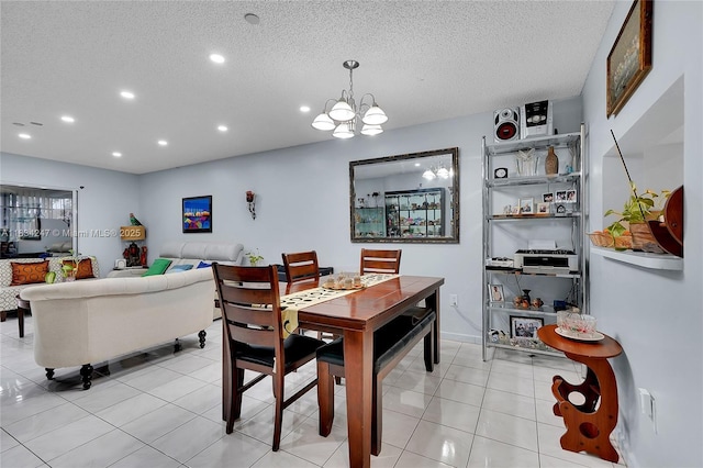571 SW 142nd Ave Unit 410O, Pembroke Pines, FL 33027 - dining room with recessed lighting, a chandelier, a textured ceiling, and light tile patterned flooring