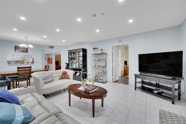 571 SW 142nd Ave Unit 410O, Pembroke Pines, FL 33027 - living room with recessed lighting, a chandelier, and light tile patterned flooring