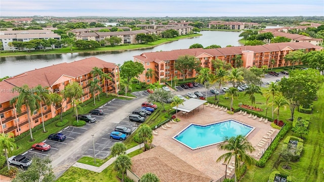 571 SW 142nd Ave Unit 410O, Pembroke Pines, FL 33027 - drone / aerial view of a nearby body of water and a pool