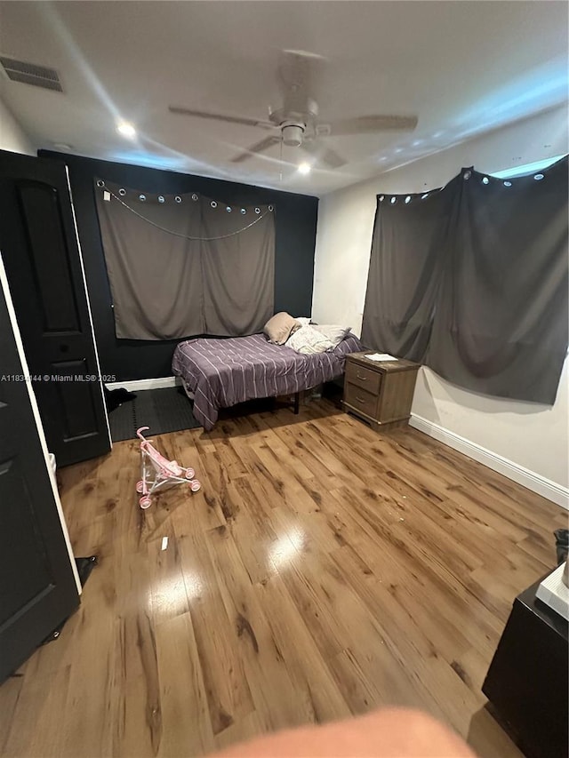 5900 NE 21st Ln, Fort Lauderdale, FL 33308 - bedroom featuring light wood-type flooring and ceiling fan