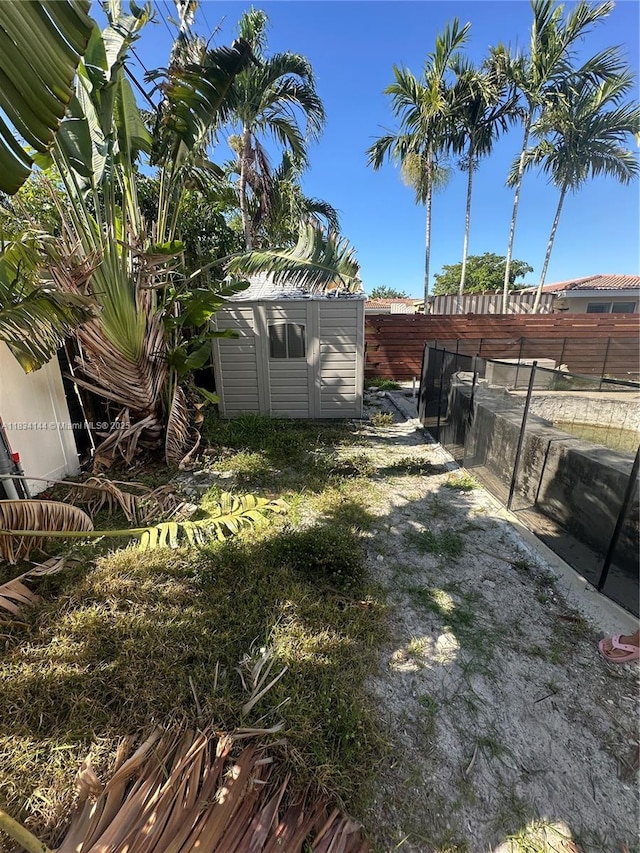 5900 NE 21st Ln, Fort Lauderdale, FL 33308 - fenced backyard with a storage shed