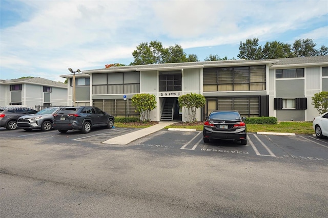 9723 Hammocks Blvd Unit 102, Miami, FL 33196 - view of property featuring uncovered parking