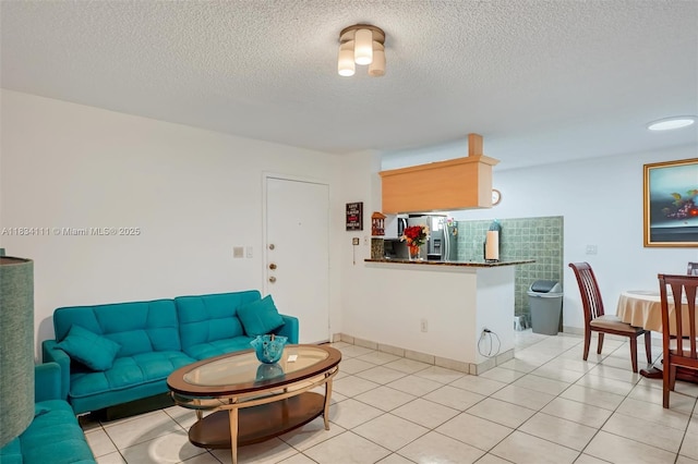 9723 Hammocks Blvd Unit 102, Miami, FL 33196 - living room with a textured ceiling and light tile patterned floors