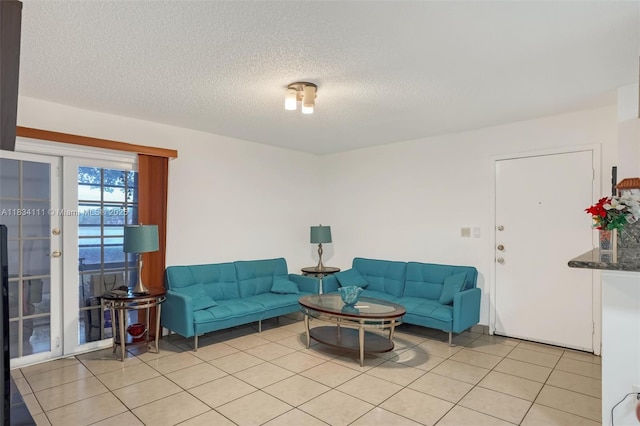 9723 Hammocks Blvd Unit 102, Miami, FL 33196 - living room with a textured ceiling and light tile patterned flooring