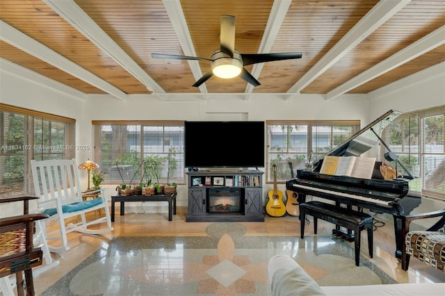 7997 SW 98th Ter, Miami, FL 33156 - living room with a glass covered fireplace, a ceiling fan, and a wood ceiling with exposed beams