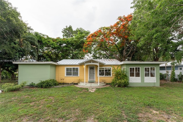 7997 SW 98th Ter, Miami, FL 33156 - single story home with a front lawn and a metal roof