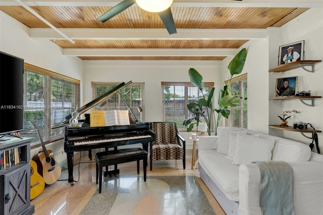7997 SW 98th Ter, Miami, FL 33156 - living room featuring a wood ceiling with exposed beams, speckle patterned floor, and ceiling fan