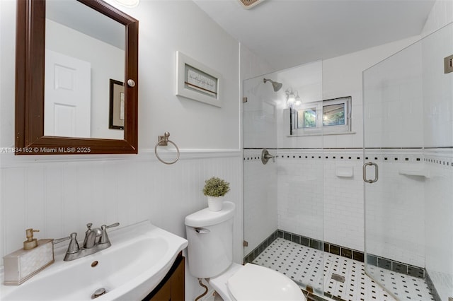 7997 SW 98th Ter, Miami, FL 33156 - full bath featuring vanity, a shower stall, and a wainscoted wall