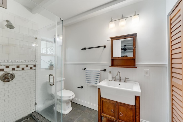 7997 SW 98th Ter, Miami, FL 33156 - bathroom with a wainscoted wall, a stall shower, tile patterned flooring, and vanity