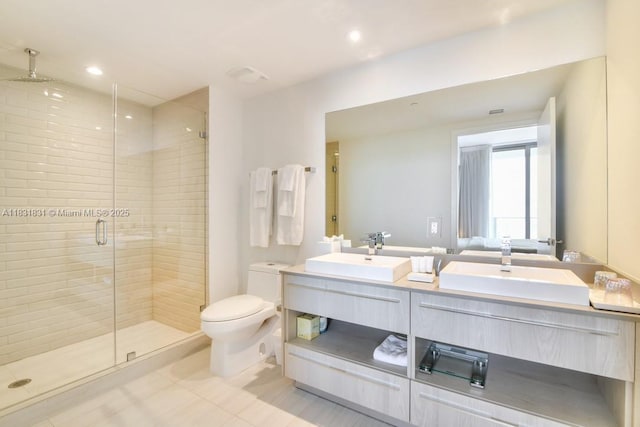 4010 S Ocean Dr Unit R1406, Hollywood, FL 33019 - full bathroom featuring double vanity, a stall shower, tile patterned flooring, and recessed lighting
