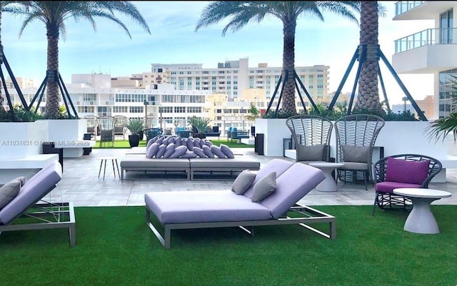 4010 S Ocean Dr Unit R1406, Hollywood, FL 33019 - view of patio with an outdoor hangout area and a view of city