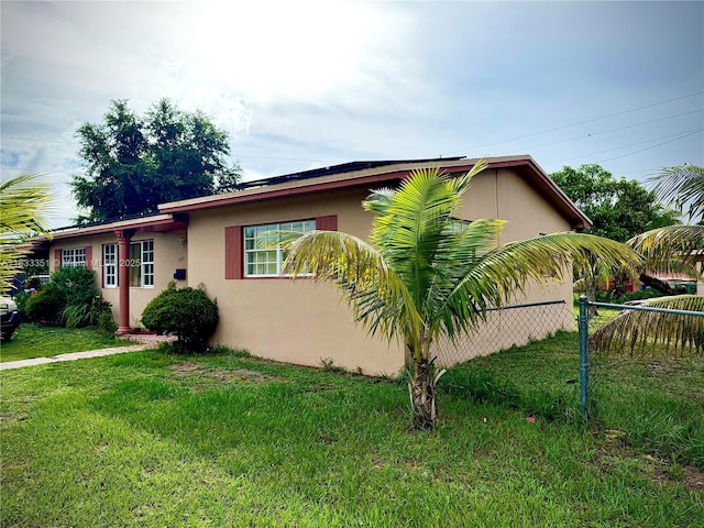 701 NW 176th Ter, Miami Gardens, FL 33169 - view of side of property featuring stucco siding