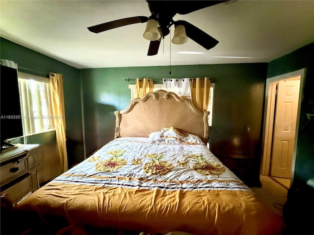 701 NW 176th Ter, Miami Gardens, FL 33169 - tiled bedroom featuring a ceiling fan