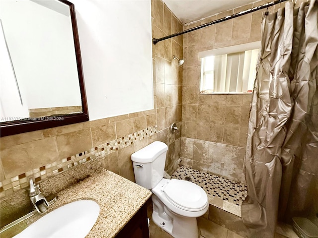 701 NW 176th Ter, Miami Gardens, FL 33169 - full bathroom with tile walls, vanity, and a tile shower