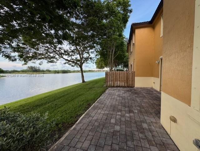 9267 SW 227th St Unit 5-8, Cutler Bay, FL 33190 - view of patio featuring a water view