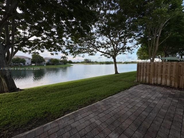 9267 SW 227th St Unit 5-8, Cutler Bay, FL 33190 - view of patio / terrace with a water view