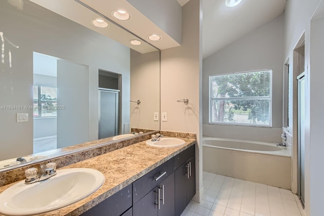 12700 SW 18th St, Miramar, FL 33027 - full bathroom featuring a garden tub, double vanity, a stall shower, lofted ceiling, and recessed lighting