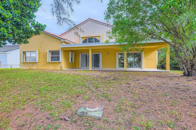 12700 SW 18th St, Miramar, FL 33027 - view of front of home featuring stucco siding and a patio