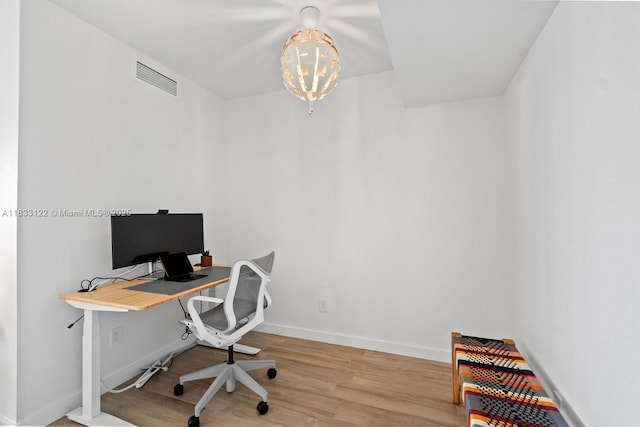 4250 Biscayne Blvd Unit 1218, Miami, FL 33137 - home office with wood finished floors and a chandelier