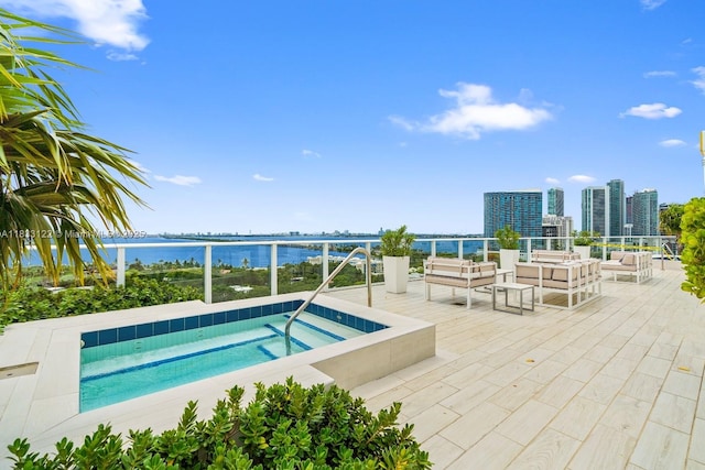 4250 Biscayne Blvd Unit 1218, Miami, FL 33137 - view of pool with a water view, a hot tub, and an outdoor hangout area