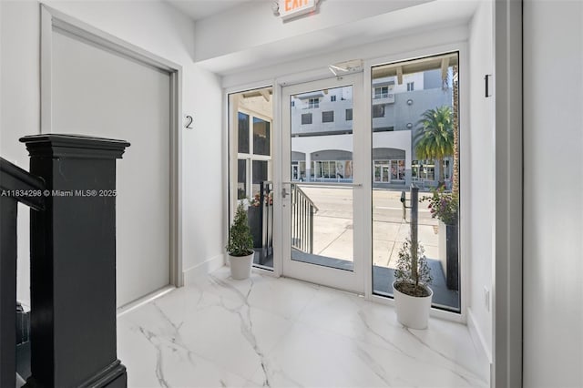 403 SW 12th Ave, Miami, FL 33130 - doorway with marble tiled flooring and baseboards