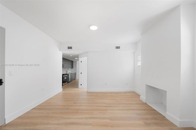403 SW 12th Ave, Miami, FL 33130 - spare room with light wood finished floors and recessed lighting