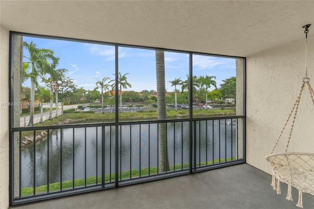 6193 Rock Island Rd Unit 216, Tamarac, FL 33319 - unfurnished sunroom with a water view