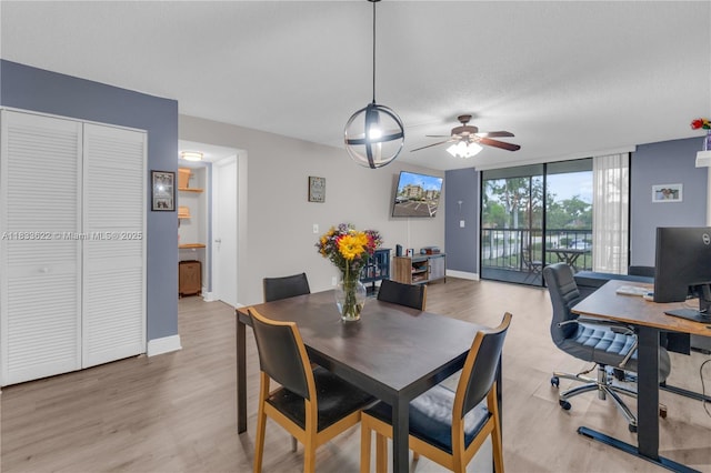 6193 Rock Island Rd Unit 216, Tamarac, FL 33319 - dining room featuring ceiling fan, light wood-style floors, and a desk