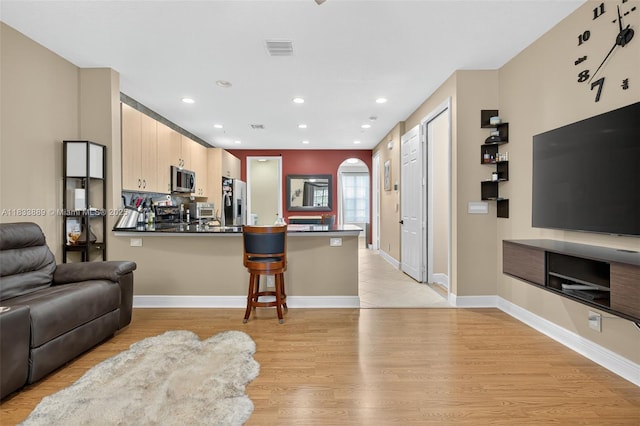 153 Apalachee Ln, Jupiter, FL 33458 - living room featuring light wood-type flooring and recessed lighting